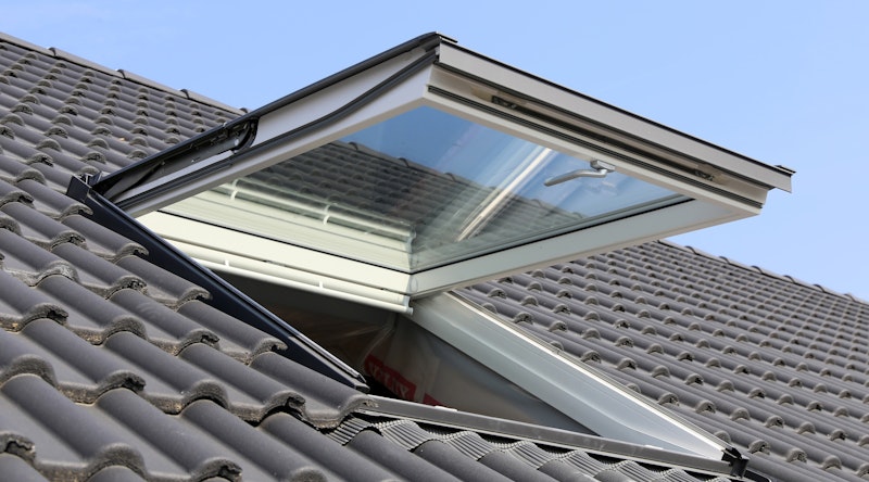 Exterior view of an open skylight. Photo from Adobe Stock.