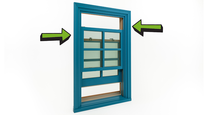 Blue Andersen double hung window with both top sash and bottom sash open. Photo by Brennan Enterprises.