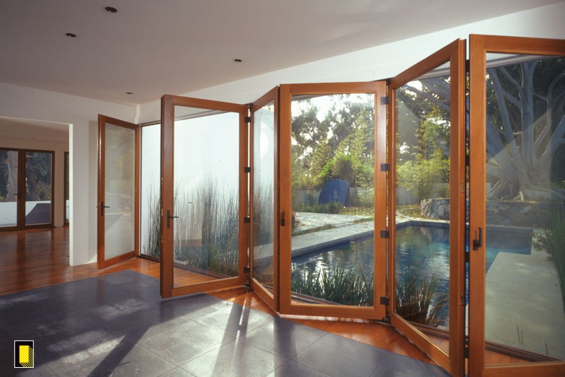 Bi-fold doors with a folded view and patio view