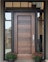Custom wood entry door with horizontal panels across center of door panel, black door trim, clear glass transom and sidelites
