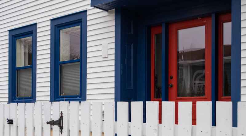 Blue trim around windows and doors. Photo from Adobe Stock.